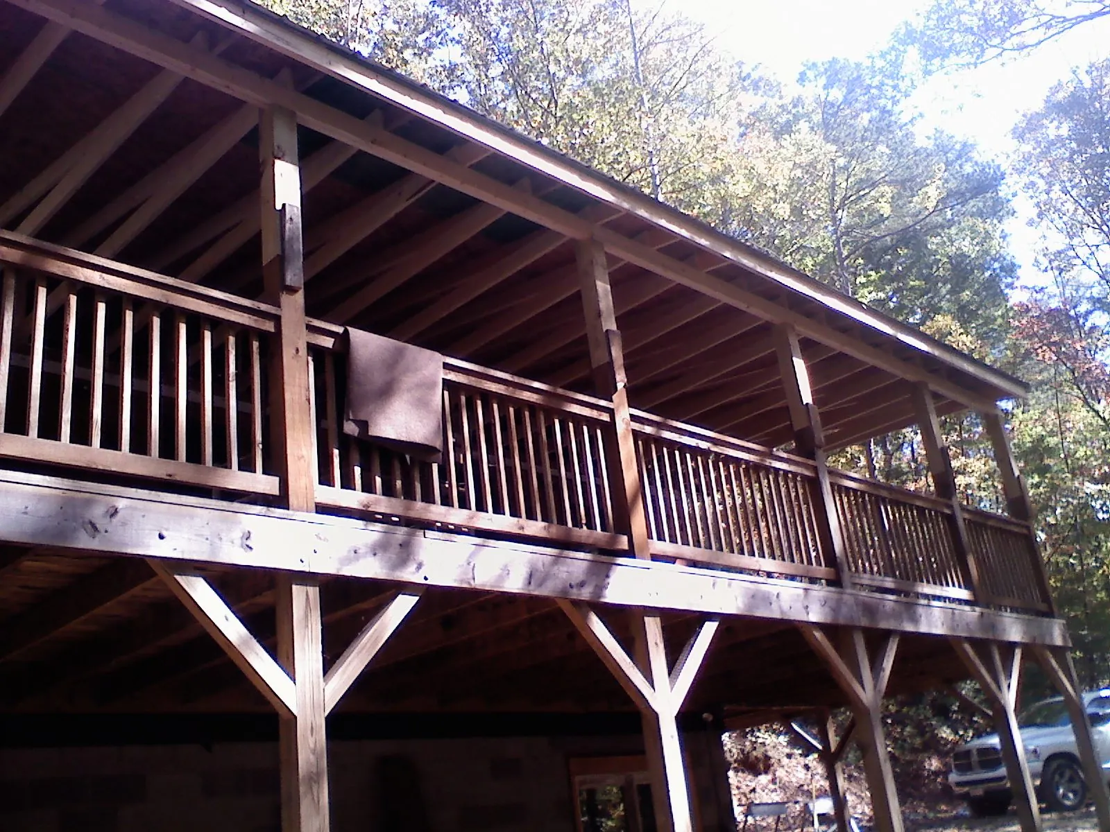 Timber framing under a new elevated porch and deck — Roof Leak Repair in Powellsville by Roofing Brothers